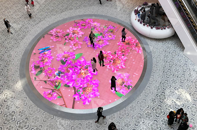 Circular interactive LED floor tile display